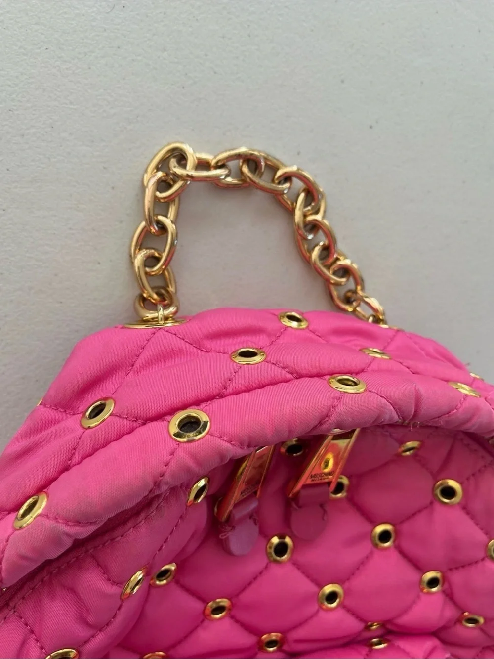 Moschino Hot Pink Quilted Eyelet Backpack with Gold Hardware
